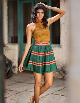 yellow crop top with deginer green skirt